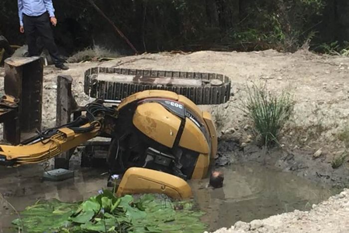 Australian man trapped excavator 1